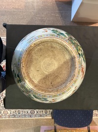 A Chinese famille verte fish bowl with birds among blossoming branches, 19th C.