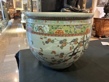 A Chinese famille verte fish bowl with birds among blossoming branches, 19th C.