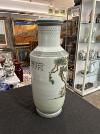 A Chinese famille rose rouleau vase with immortals in a garden, Qianlong mark, 20th C.