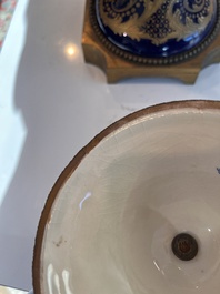 Een paar grote S&egrave;vres porseleinen vazen met allegorie&euml;n van 'De oogst' en 'De visvangst' op verguld bronzen monturen, Frankrijk, 19de eeuw