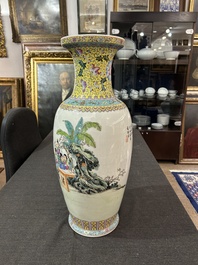 A Chinese famille rose 'antiquities' vase and a vase with figures in a garden, 19th/20th C.