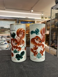 Two Chinese iron-red 'Buddhist lions' hat stands, 19th/20th C.