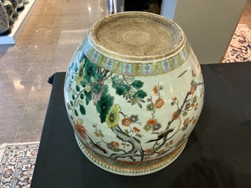 A Chinese famille verte fish bowl with birds among blossoming branches, 19th C.