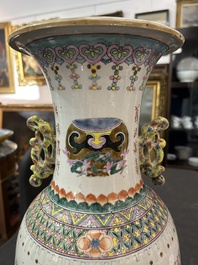 A Chinese famille rose 'antiquities' vase and a vase with figures in a garden, 19th/20th C.