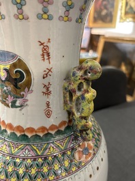 A Chinese famille rose 'antiquities' vase and a vase with figures in a garden, 19th/20th C.