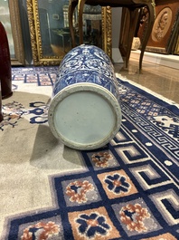 A pair of Chinese famille rose vases and a tall blue and white vase, 19th/20th C.