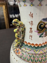 A Chinese famille rose 'antiquities' vase and a vase with figures in a garden, 19th/20th C.