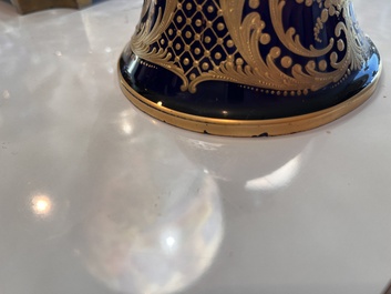 Een paar grote S&egrave;vres porseleinen vazen met allegorie&euml;n van 'De oogst' en 'De visvangst' op verguld bronzen monturen, Frankrijk, 19de eeuw