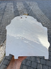 A polychrome Delftware birdcage plaque, Tichelaar, Makkum, Friesland, 19th C.