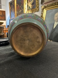 Nine Chinese cloisonn&eacute; vases and a covered bowl, 20th C.