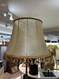 A reticulated Chinese wooden stand with marble top and a French gilt brass and champlev&eacute; 'elephant' lamp, 20th C.