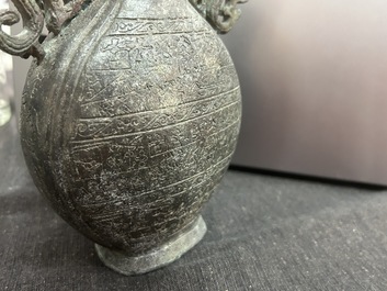 A Chinese bronze 'bianhu' vase and a 'zhong' bell, possibly Han and Western Zhou Dynasty