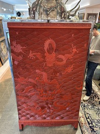 A Chinese five-piece red lacquer throne ensemble with dragons in imperial Qianlong style, 20th C.