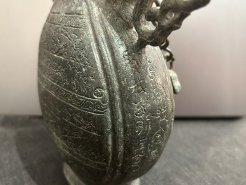 A Chinese bronze 'bianhu' vase and a 'zhong' bell, possibly Han and Western Zhou Dynasty