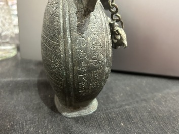 A Chinese bronze 'bianhu' vase and a 'zhong' bell, possibly Han and Western Zhou Dynasty