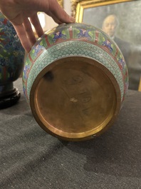 Nine Chinese cloisonn&eacute; vases and a covered bowl, 20th C.