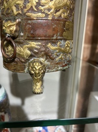 A Chinese parcel-gilt copper tripod 'zun' archaic vessel, probably 17th/18th C.