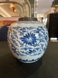 A Chinese blue and white jar with reticulated wooden cover, Kangxi