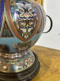 A pair of Chinese cloisonn&eacute; 'taotie masks' vases, 20th C.