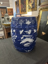 A Chinese white-slip-decorated blue-ground garden seat and two jardini&egrave;res, 19th C.