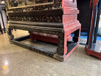 A Chinese five-piece red lacquer throne ensemble with dragons in imperial Qianlong style, 20th C.
