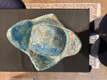 A large Chinese partly turquoise-glazed pottery head of Guanyin in Ming style, probably 19th C.