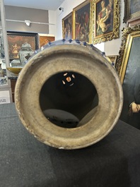 A Chinese white-slip-decorated blue-ground garden seat and two jardini&egrave;res, 19th C.