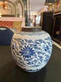 A Chinese blue and white jar with reticulated wooden cover, Kangxi