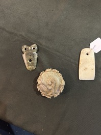 A small Chinese ritual axe, a water jar and a pendant in jade and hardstone, possibly Liangzhu or Han
