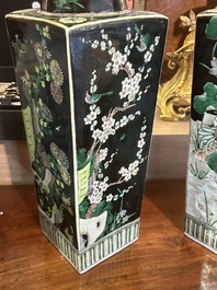 A pair of Chinese square famille noire vases with floral design, Kangxi mark, 19th/20th C.