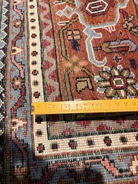 A Persian Bidjar rug with floral design, wool on cotton, 20th C.