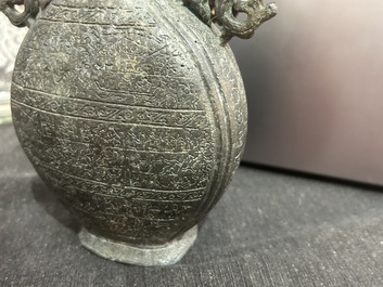 A Chinese bronze 'bianhu' vase and a 'zhong' bell, possibly Han and Western Zhou Dynasty