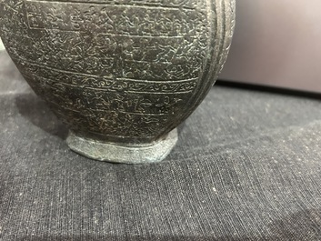 A Chinese bronze 'bianhu' vase and a 'zhong' bell, possibly Han and Western Zhou Dynasty