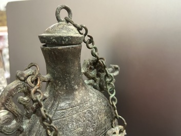 A Chinese bronze 'bianhu' vase and a 'zhong' bell, possibly Han and Western Zhou Dynasty