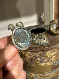 A Chinese parcel-gilt copper tripod 'zun' archaic vessel, probably 17th/18th C.