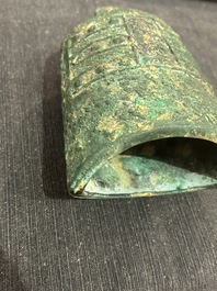 A Chinese bronze 'bianhu' vase and a 'zhong' bell, possibly Han and Western Zhou Dynasty