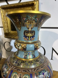A pair of Chinese cloisonn&eacute; 'taotie masks' vases, 20th C.