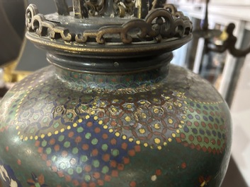 A pair of Japanese cloisonn&eacute; vases with French partly gilt bronze chinoiserie candelabra mounts, 19th C.