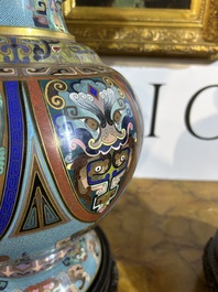 A pair of Chinese cloisonn&eacute; 'taotie masks' vases, 20th C.