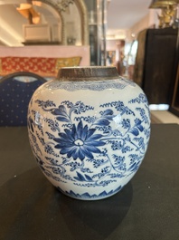 A Chinese blue and white jar with reticulated wooden cover, Kangxi