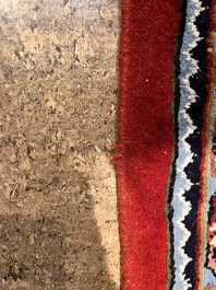 A Persian Bidjar rug with floral design, wool on cotton, 20th C.