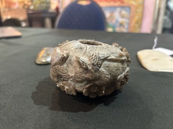 A small Chinese ritual axe, a water jar and a pendant in jade and hardstone, possibly Liangzhu or Han