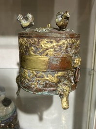 A Chinese parcel-gilt copper tripod 'zun' archaic vessel, probably 17th/18th C.