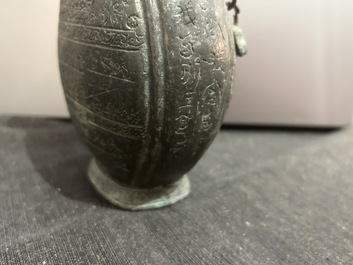 A Chinese bronze 'bianhu' vase and a 'zhong' bell, possibly Han and Western Zhou Dynasty