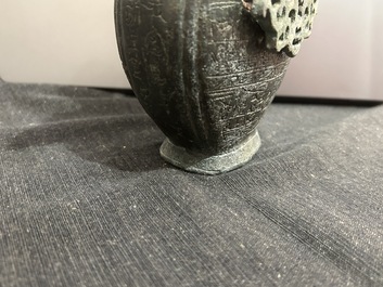 A Chinese bronze 'bianhu' vase and a 'zhong' bell, possibly Han and Western Zhou Dynasty