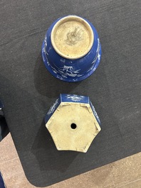 A Chinese white-slip-decorated blue-ground garden seat and two jardini&egrave;res, 19th C.