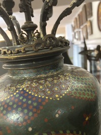 A pair of Japanese cloisonn&eacute; vases with French partly gilt bronze chinoiserie candelabra mounts, 19th C.