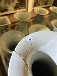 A pair of Chinese famille rose vases and a tall blue and white vase, 19th/20th C.