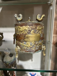 A Chinese parcel-gilt copper tripod 'zun' archaic vessel, probably 17th/18th C.