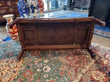 A Chinese low table with partly polychromed wooden top with engraved dragon and phoenix design, Qing and 20th C.